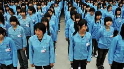 Pracovníci čínské továrny