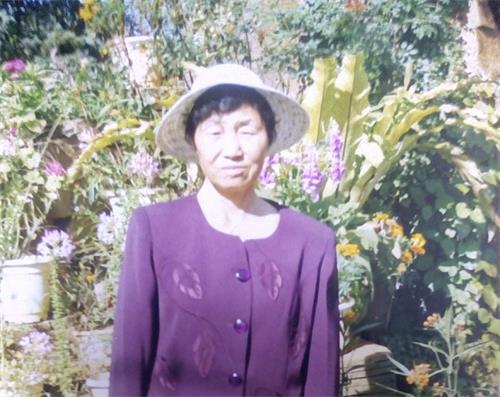 Paní Ting Kuej-jing, následovnice metody Falun Gong, meditační praxi pro zušlechťování těla a mysli, zakořenění v buddhistické a taoistické tradici. (Se svolením Minghui.org)